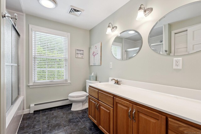 1 Spinnaker Rd, Waterford, CT 06385 - bathroom with baseboard heating, vanity, toilet, tile patterned flooring, and baseboards