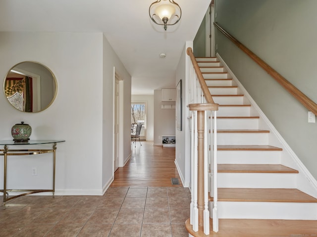 235 Lonetown Rd, Redding, CT 06896 - stairs with tile patterned flooring and baseboards
