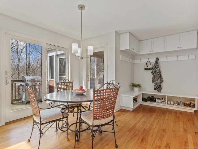 235 Lonetown Rd, Redding, CT 06896 - dining room with light wood finished floors and a chandelier