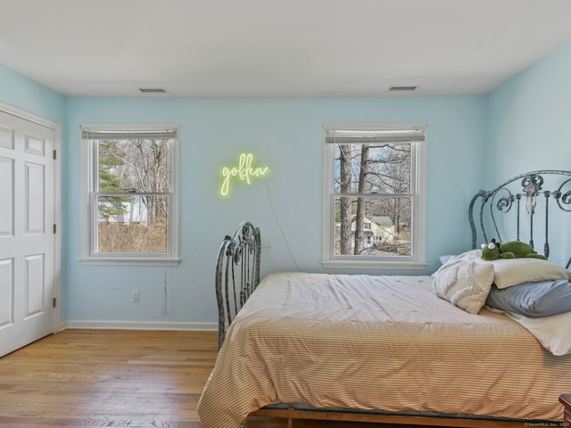 235 Lonetown Rd, Redding, CT 06896 - bedroom with wood finished floors and baseboards