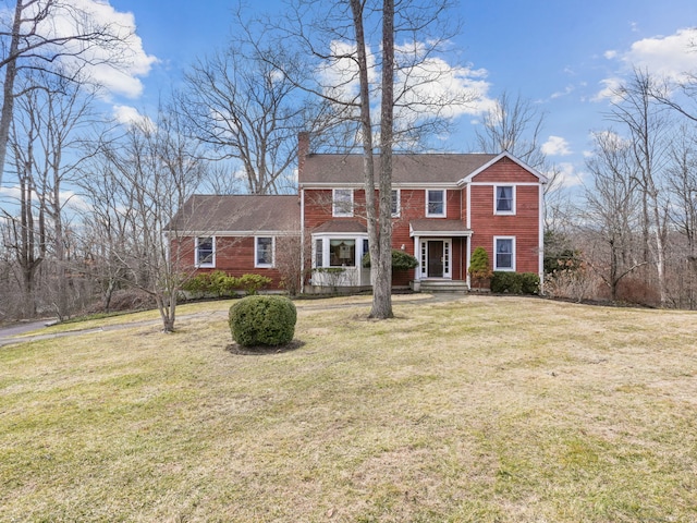 235 Lonetown Rd, Redding, CT 06896 - view of front of house with a chimney and a front yard