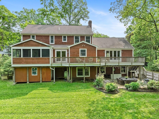 235 Lonetown Rd, Redding, CT 06896 - rear view of house featuring a chimney, a wooden deck, a patio area, a sunroom, and a lawn