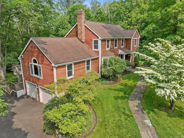 235 Lonetown Rd, Redding, CT 06896 - view of front of house featuring a chimney, driveway, a shingled roof, and an attached garage