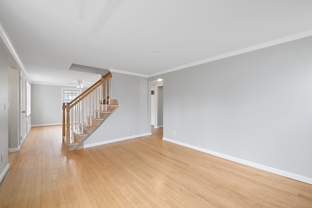73 Camp Ave, Newington, CT 06111 - unfurnished living room featuring stairway, light wood-type flooring, ceiling fan, and ornamental molding