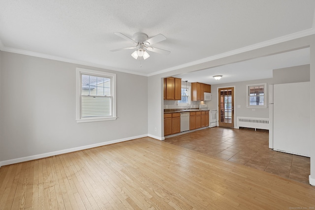 73 Camp Ave, Newington, CT 06111 - unfurnished living room featuring radiator heating unit, ceiling fan, ornamental molding, and light wood-style floors