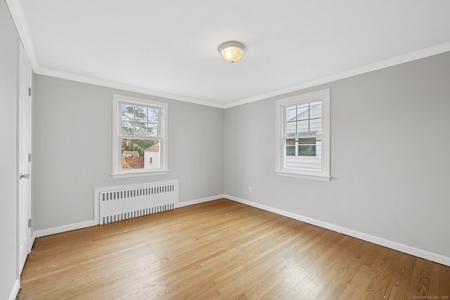 73 Camp Ave, Newington, CT 06111 - empty room with radiator heating unit, wood-type flooring, and ornamental molding