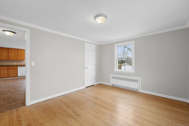 73 Camp Ave, Newington, CT 06111 - empty room featuring radiator heating unit, light wood finished floors, and crown molding