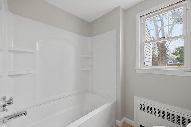 73 Camp Ave, Newington, CT 06111 - full bathroom featuring radiator heating unit, healthy amount of natural light, and shower / tub combination