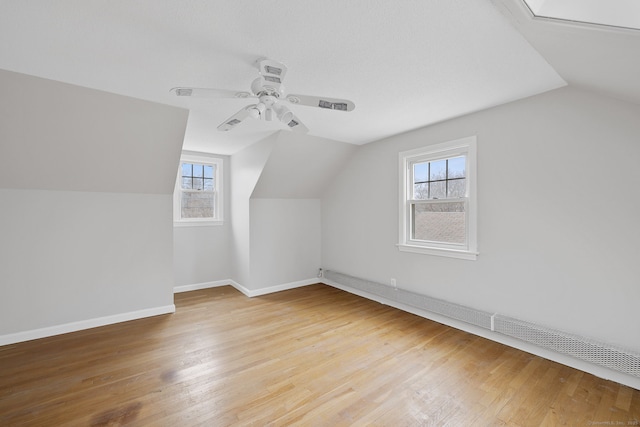 73 Camp Ave, Newington, CT 06111 - additional living space featuring vaulted ceiling, healthy amount of natural light, light wood-type flooring, and a ceiling fan