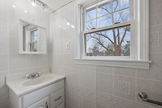 73 Camp Ave, Newington, CT 06111 - bathroom featuring vanity and tile walls
