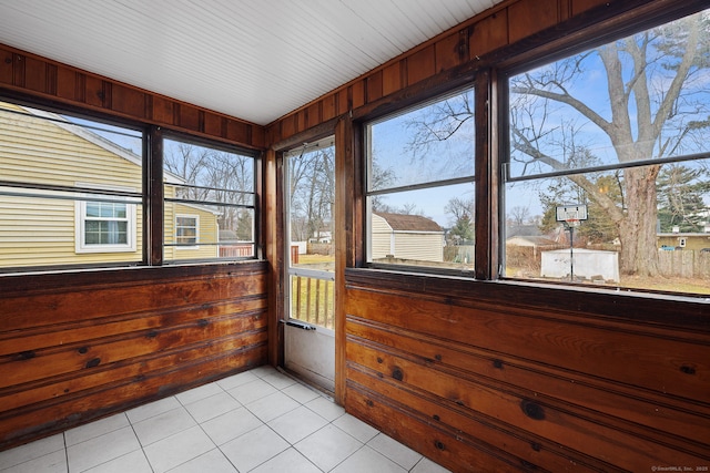 73 Camp Ave, Newington, CT 06111 - sunroom with tile patterned floors, plenty of natural light, and wooden walls