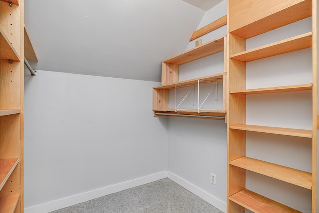 77 Crest Rd, Middlebury, CT 06762 - walk in closet with carpet floors and lofted ceiling