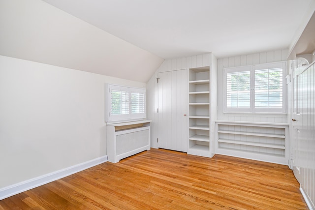 77 Crest Rd, Middlebury, CT 06762 - bonus room with light wood-type flooring, healthy amount of natural light, baseboards, radiator, and vaulted ceiling