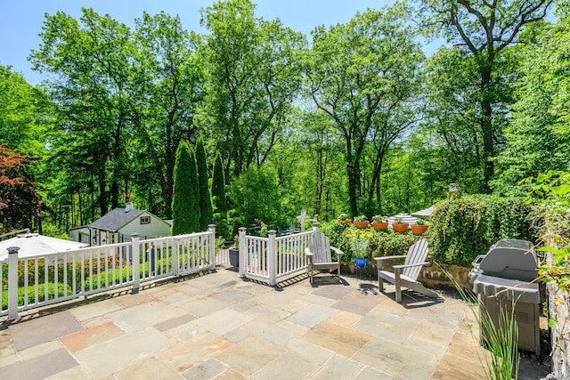 77 Crest Rd, Middlebury, CT 06762 - view of patio / terrace with an outdoor structure and a grill