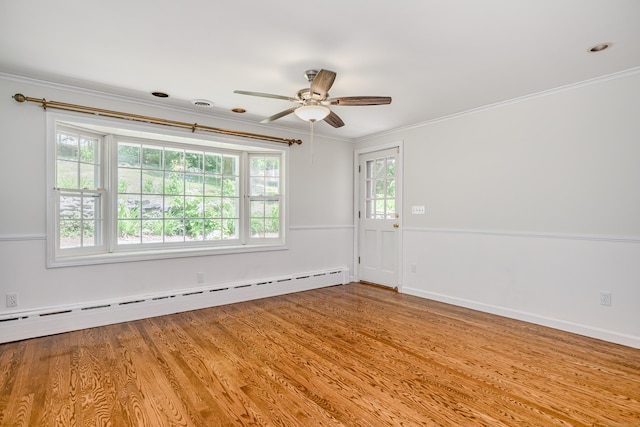 77 Crest Rd, Middlebury, CT 06762 - empty room featuring a baseboard heating unit, crown molding, wood finished floors, a ceiling fan, and baseboards
