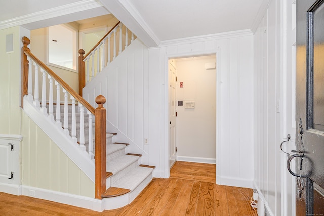 77 Crest Rd, Middlebury, CT 06762 - stairway with wood finished floors, a decorative wall, and baseboards