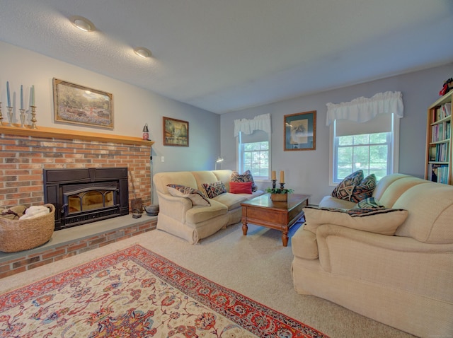 193 Pickett Rd, Plainfield, CT 06374 - living area featuring carpet and a fireplace
