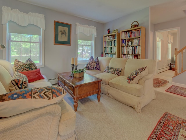 193 Pickett Rd, Plainfield, CT 06374 - living area with a baseboard radiator and carpet floors