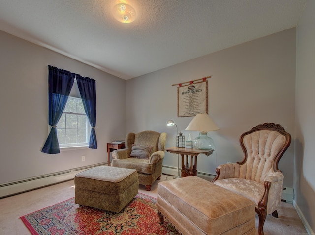 193 Pickett Rd, Plainfield, CT 06374 - living area with carpet, a baseboard radiator, baseboard heating, a textured ceiling, and baseboards