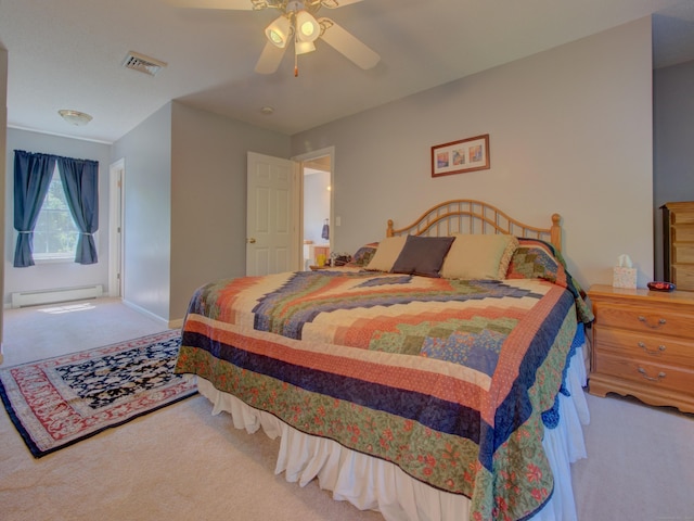 193 Pickett Rd, Plainfield, CT 06374 - bedroom featuring carpet, a baseboard heating unit, a ceiling fan, and baseboards