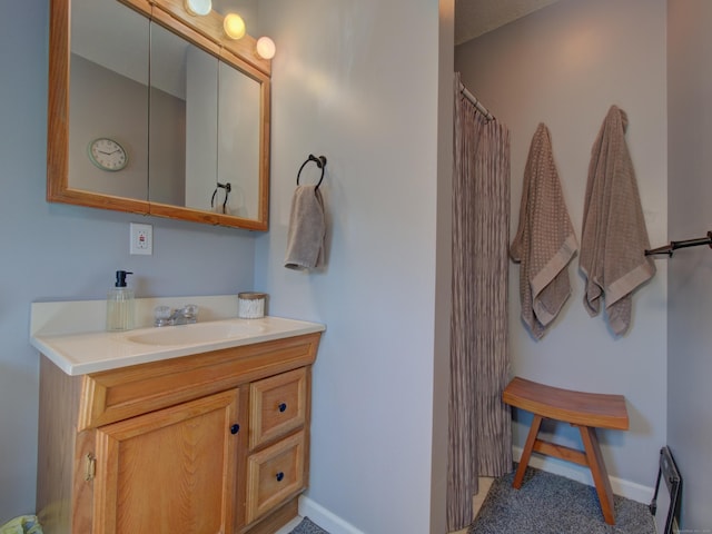 193 Pickett Rd, Plainfield, CT 06374 - bathroom with vanity, baseboards, and a shower with shower curtain