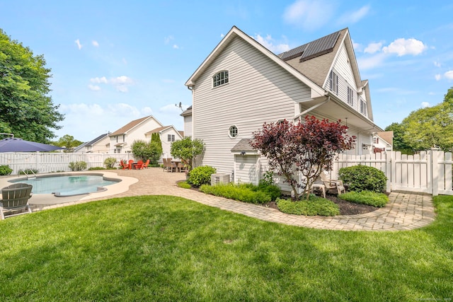 55 Perry Ln, Stratford, CT 06614 - rear view of house with a patio, central air condition unit, and roof with shingles