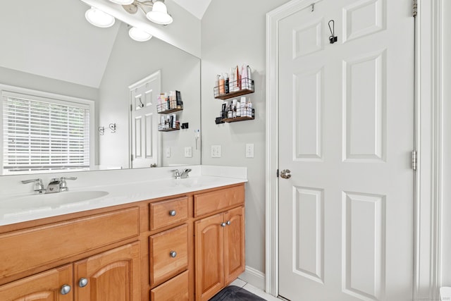 55 Perry Ln, Stratford, CT 06614 - full bath with double vanity and lofted ceiling