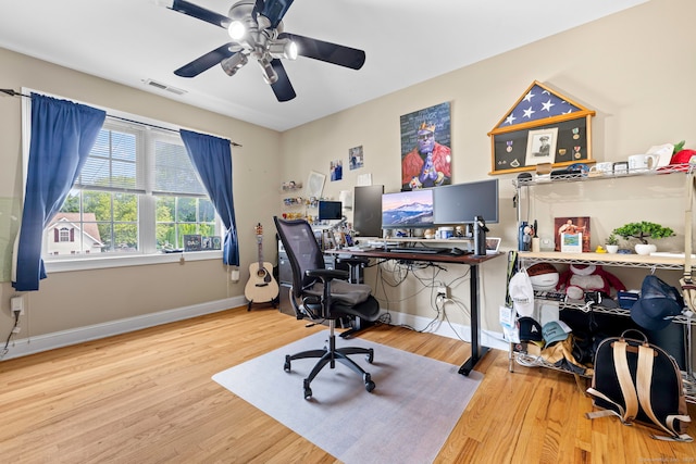 55 Perry Ln, Stratford, CT 06614 - office area with wood finished floors, a ceiling fan, and baseboards