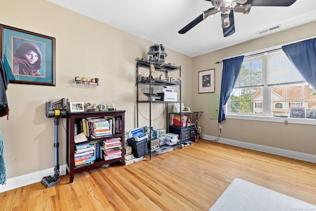 55 Perry Ln, Stratford, CT 06614 - misc room with wood finished floors, a ceiling fan, and baseboards