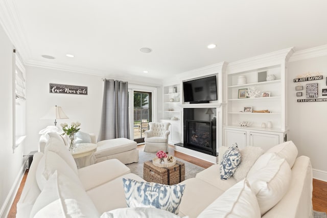 334 W Ave, Darien, CT 06820 - living room featuring wood finished floors, baseboards, crown molding, a large fireplace, and recessed lighting