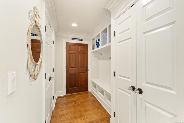 334 W Ave, Darien, CT 06820 - mudroom with ornamental molding, light wood-type flooring, and recessed lighting