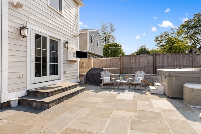 334 W Ave, Darien, CT 06820 - view of patio / terrace with a hot tub and area for grilling