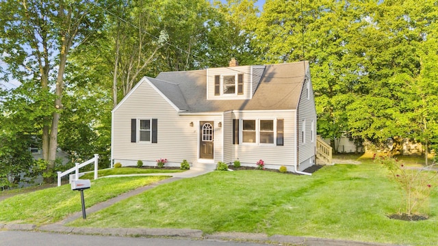 37 View St, East Haven, CT 06512 - view of front of property featuring a front lawn and a chimney