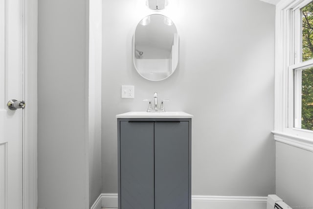 37 View St, East Haven, CT 06512 - bathroom with vanity, a baseboard heating unit, and baseboards
