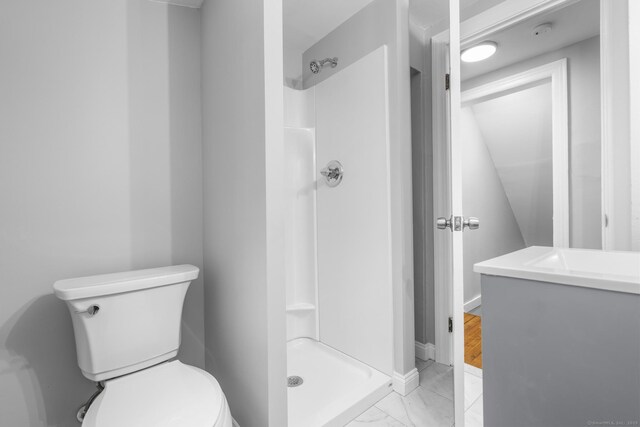 37 View St, East Haven, CT 06512 - bathroom with a stall shower, marble look tiles, toilet, vanity, and baseboards