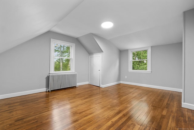 37 View St, East Haven, CT 06512 - bonus room featuring radiator heating unit, hardwood / wood-style flooring, lofted ceiling, and baseboards