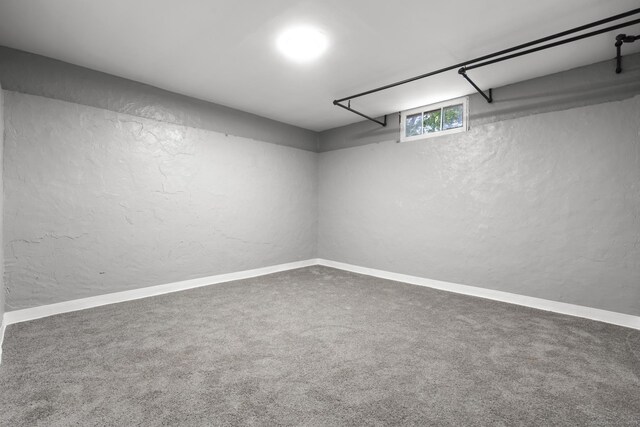 37 View St, East Haven, CT 06512 - basement featuring a textured wall, carpet floors, and baseboards