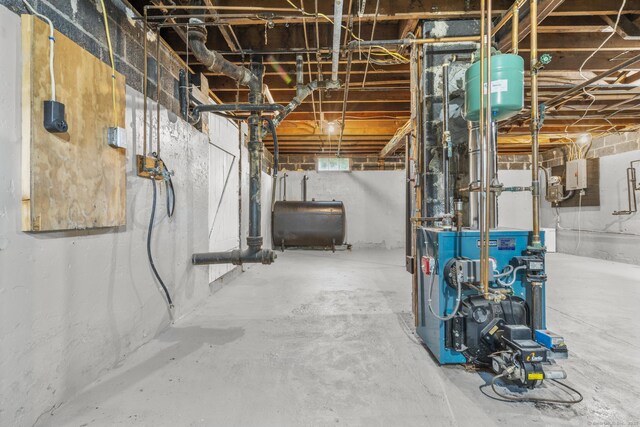 37 View St, East Haven, CT 06512 - unfinished basement with oil tank and a heating unit