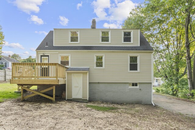37 View St, East Haven, CT 06512 - back of house featuring a shingled roof, a deck, and a chimney