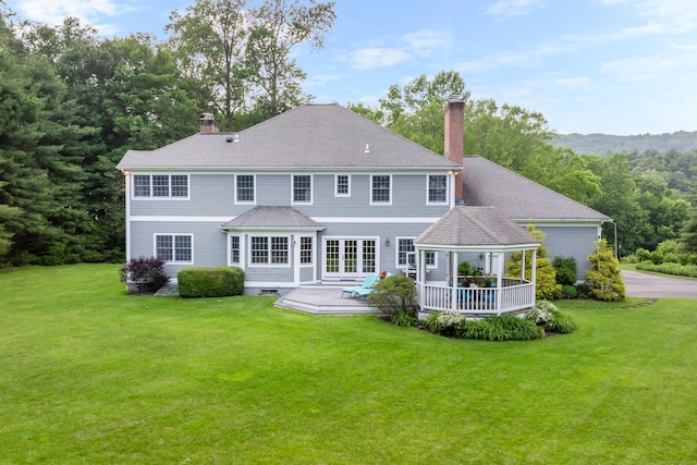 3 Mountaincrest Dr, Cheshire, CT 06410 - back of property featuring a chimney, a gazebo, a wooden deck, and a lawn