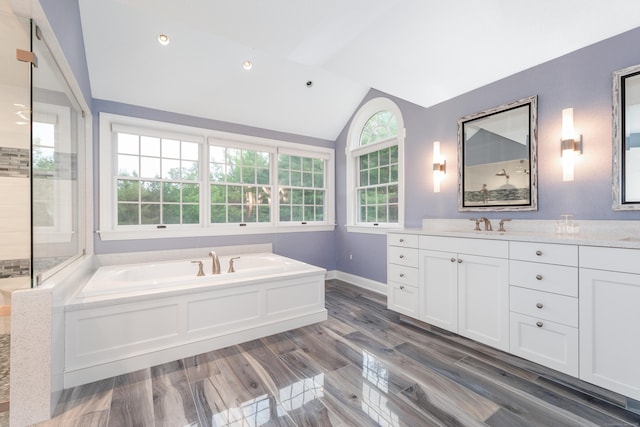 3 Mountaincrest Dr, Cheshire, CT 06410 - full bath featuring lofted ceiling, a bath, vanity, wood finished floors, and baseboards