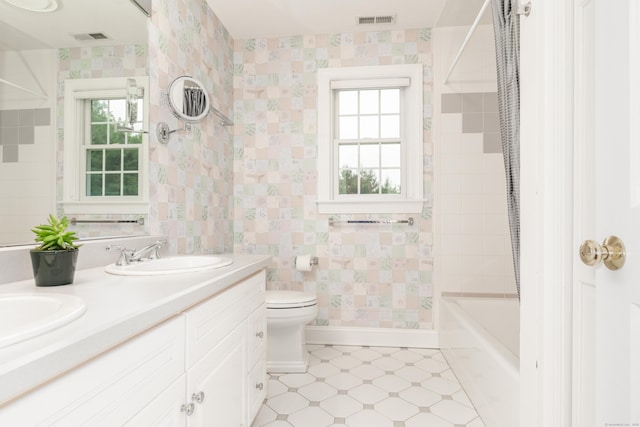 3 Mountaincrest Dr, Cheshire, CT 06410 - full bathroom featuring double vanity, toilet,  shower combination, baseboards, and wallpapered walls