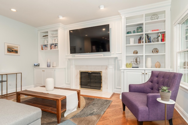 3 Mountaincrest Dr, Cheshire, CT 06410 - living room with light wood-style floors, a high end fireplace, and built in features