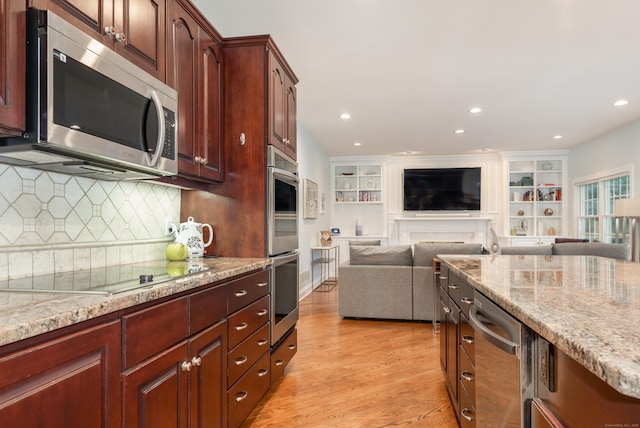 3 Mountaincrest Dr, Cheshire, CT 06410 - kitchen featuring stainless steel appliances, open floor plan, light wood-type flooring, light stone counters, and recessed lighting