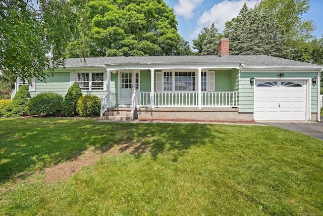86 Rice Rd, Meriden, CT 06450 - single story home featuring a porch, a chimney, an attached garage, driveway, and a front yard