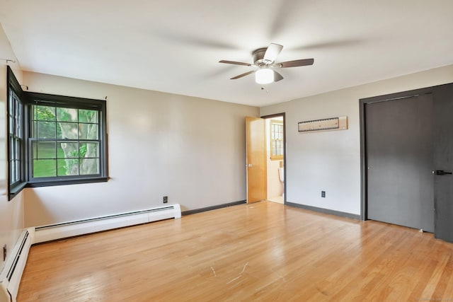 86 Rice Rd, Meriden, CT 06450 - unfurnished bedroom featuring baseboard heating, light wood finished floors, and ceiling fan