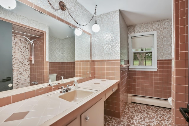 86 Rice Rd, Meriden, CT 06450 - full bathroom featuring tile walls, a baseboard heating unit, toilet, wallpapered walls, and tiled shower