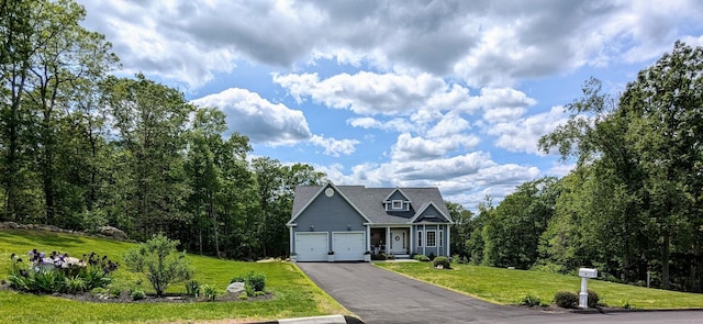 5 Newberry St, Haddam, CT 06441 - view of front of property featuring a front lawn, a garage, and asphalt driveway