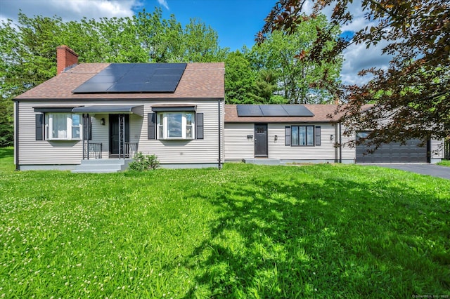 75 Carll Rd, Middletown, CT 06457 - view of front of home featuring roof with shingles, a front lawn, and a chimney