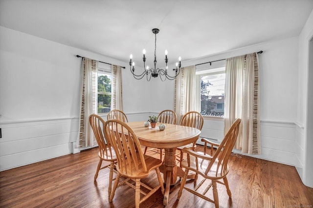 75 Carll Rd, Middletown, CT 06457 - dining room with a chandelier, wood finished floors, and a wainscoted wall